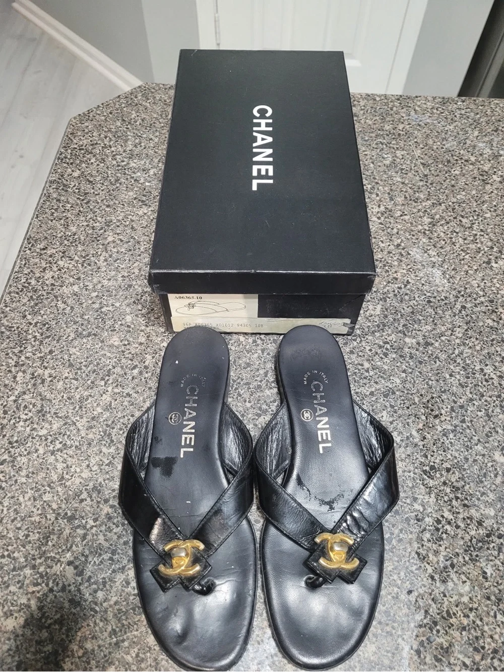 CHANEL Black Leather Thong Sandals with Gold CC Accent